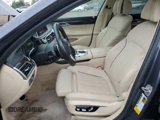 2016 BMW 7 Series 750i with VIN WBA7F0C54GGL99661, listed as a Copart auction lot 71742154 with 104,498 mi miles and Salvage Title. Bid and sale history available at carsss.com. Image 7.