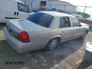 2008 Mercury Grand Marquis GS with VIN 2MEFM74V38X611049, listed as a IAAI auction lot 41869117 with 162,669 mi miles and . Bid and sale history available at DreamBid. Image 4.