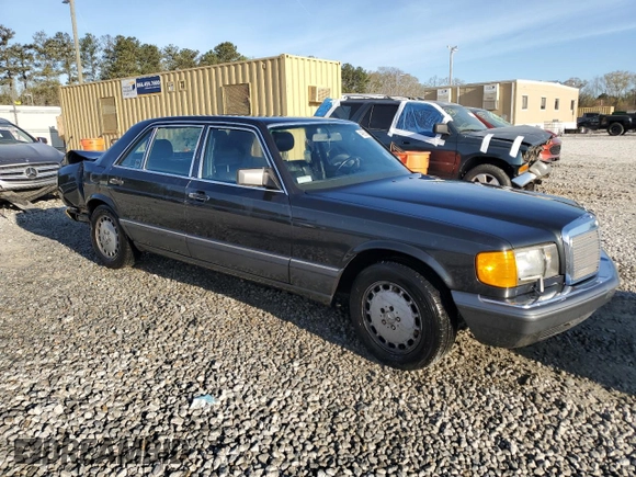 1989 Mercedes-Benz 560 with VIN WDBCA39E9KA463003, listed as a Copart auction lot 49808495 with 125,388 mi miles and Salvage Title. Bid and sale history available at DreamBid. Image 4.