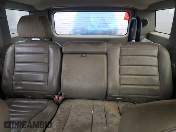 2003 Hummer H2 with VIN 5GRGN23UX3H147490, listed as a Copart auction lot 82876424 with 241,737 mi miles and Clean Title. Bid and sale history available at carsss.com. Image 10.