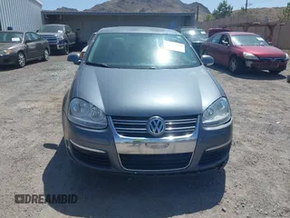 2009 Volkswagen Jetta SE z VIN 3VWRZ71K09M088979, wystawiony jako IAAI lot #42532075 z przebiegiem 179 179 mil mil oraz . Historia ofert i sprzedaży dostępna na DreamBid. Obrazek 6.
