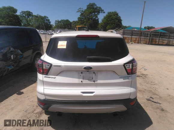 2017 Ford Escape Titanium with VIN 1FMCU0JD8HUE52149, listed as a IAAI auction lot 41974274 with 143,707 mi miles and . Bid and sale history available at DreamBid. Image 16.