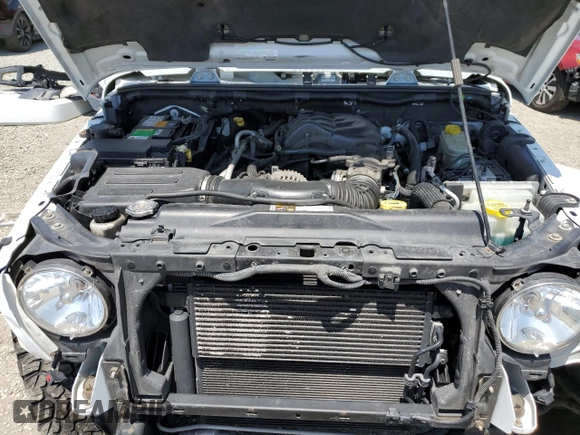 2015 Jeep Wrangler Unlimited Rubicon with VIN 1C4BJWFG6FL508493, listed as a Copart auction lot 54788635 with 127,694 mi miles and Salvage title. Bid and sale history available at DreamBid. Image 12.