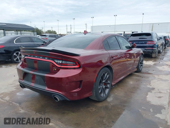 2020 Dodge Charger Scat Pack z VIN 2C3CDXGJ8LH132985, wystawiony jako IAAI lot #41316849 z przebiegiem 66 881 mil mil oraz . Historia ofert i sprzedaży dostępna na DreamBid. Obrazek 4.