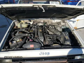 1988 Jeep Cherokee with VIN 1JCMR7813JT058390, listed as a Copart auction lot 89071925 with 2,331,297 mi miles and Clean title. Bid and sale history available at DreamBid. Image 11.