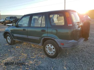 2000 Honda CR-V LX with VIN JHLRD1848YC038520, listed as a Copart auction lot 74137634 with 104,332 mi miles and Salvage Title. Bid and sale history available at carsss.com. Image 2.
