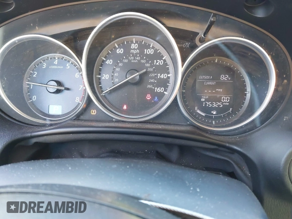 2014 Mazda CX-5 Touring with VIN JM3KE2CYXE0310873, listed as a IAAI auction lot 41309633 with 175,325 mi miles and . Bid and sale history available at DreamBid. Image 7.