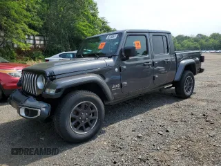 2023 Jeep Gladiator Overland z VIN 1C6HJTFGXPL523659, wystawiony jako Copart lot #61047435 z przebiegiem 40 468 mil mil oraz Czysty tytuł • Clean title. Historia ofert i sprzedaży dostępna na DreamBid. Obrazek 1.