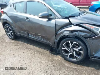 2018 Toyota C-HR XLE with VIN NMTKHMBX0JR008776, listed as a IAAI auction lot 42472338 with 48,910 mi miles and . Bid and sale history available at DreamBid. Image 17.