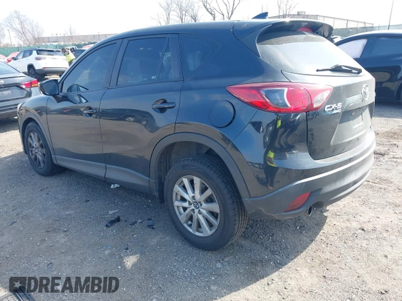 2016 Mazda CX-5 Sport with VIN JM3KE4BY3G0843177, listed as a IAAI auction lot 41804094 with 193,461 mi miles. Bid and sale history available at carsss.com. Image 3.