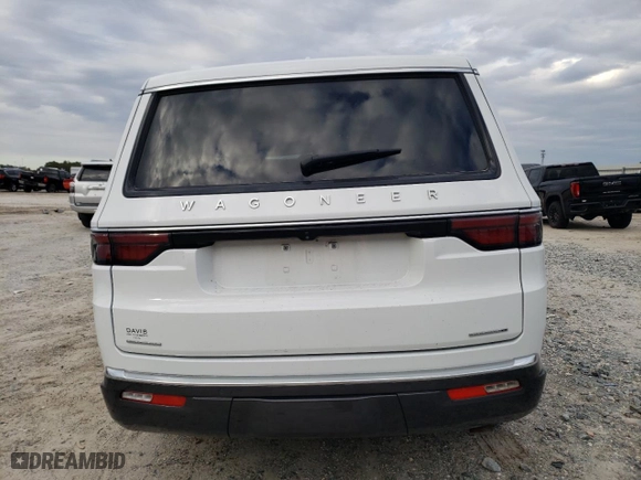 2022 Jeep Wagoneer Series II with VIN 1C4SJVBT7NS110940, listed as a Copart auction lot 42140615 with 63,507 mi miles and Salvage Title. Bid and sale history available at carsss.com. Image 6.
