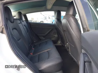 2022 Tesla Model 3 with VIN 5YJ3E1EA1NF167711, listed as a IAAI auction lot 41594266 with 50,554 mi miles and . Bid and sale history available at DreamBid. Image 8.