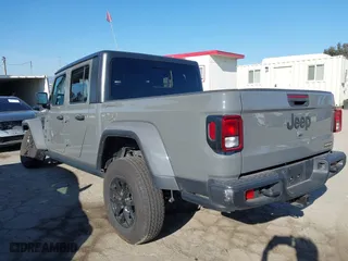 2023 Jeep Gladiator Freedom with VIN 1C6HJTAG9PL517097, listed as a IAAI auction lot 41860666 with 24,478 mi miles. Bid and sale history available at carsss.com. Image 3.