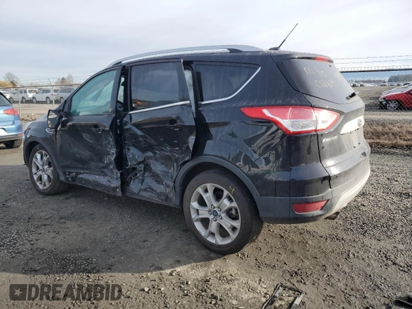 2016 Ford Escape Titanium with VIN 1FMCU0J9XGUA30359, listed as a Copart auction lot 89178985 with 148,718 mi miles and Salvage Title. Bid and sale history available at carsss.com. Image 2.