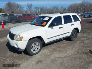 2006 Jeep Grand Cherokee Laredo with VIN 1J4GR48K56C294546, listed as a IAAI auction lot 41672848 with 193,993 mi miles. Bid and sale history available at carsss.com. Image 2.
