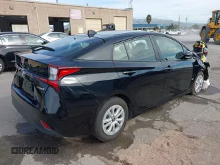 2022 Toyota Prius L Eco with VIN JTDKAMFU2N3157283, listed as a IAAI auction lot 41620334 with 59,754 mi miles. Bid and sale history available at carsss.com. Image 4.