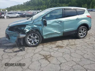 2013 Ford Escape SEL z VIN 1FMCU9H98DUC56048, wystawiony jako Copart lot #61613085 z przebiegiem 198 102 mil mil oraz Szkoda całkowita • Salvage title. Historia ofert i sprzedaży dostępna na DreamBid. Obrazek 1.