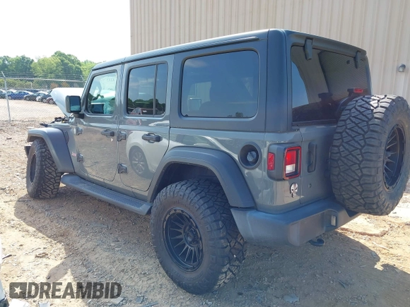 2019 Jeep Wrangler Unlimited Sport S with VIN 1C4HJXDG3KW662946, listed as a IAAI auction lot 42157025 with 26,096 mi miles and . Bid and sale history available at DreamBid. Image 3.