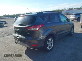 2016 Ford Escape SE with VIN 1FMCU9GX3GUB78749, listed as a IAAI auction lot 42030262 with 93,365 mi miles. Bid and sale history available at carsss.com. Image 4.