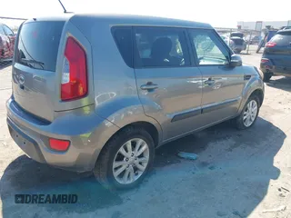 2012 Kia Soul + with VIN KNDJT2A69C7386679, listed as a IAAI auction lot 41969598 with 319,595 mi miles. Bid and sale history available at carsss.com. Image 4.