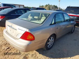 2000 Toyota Avalon XL with VIN 4T1BF28B7YU022621, listed as a IAAI auction lot 41883534 with 200,164 mi miles and . Bid and sale history available at DreamBid. Image 4.
