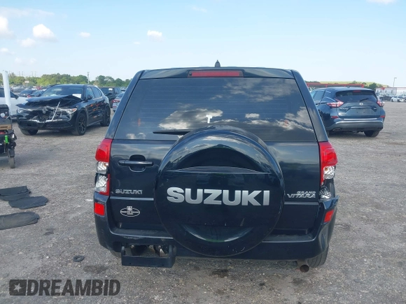 2008 Suzuki Grand Vitara with VIN JS3TE941284102380, listed as a IAAI auction lot 42061609 with 103,554 mi miles and . Bid and sale history available at DreamBid. Image 16.