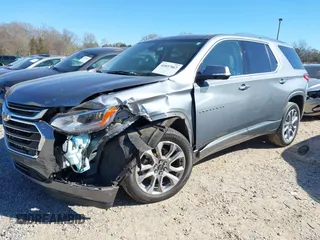 2020 Chevrolet Traverse Premier with VIN 1GNERKKW3LJ128117, listed as a IAAI auction lot 41857067 with 77,700 mi miles and . Bid and sale history available at DreamBid. Image 22.