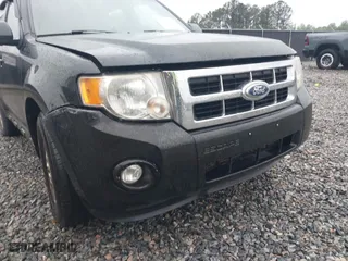 2010 Ford Escape XLT with VIN 1FMCU0DG2AKB66255, listed as a IAAI auction lot 41982329 with 192,564 mi miles. Bid and sale history available at carsss.com. Image 13.