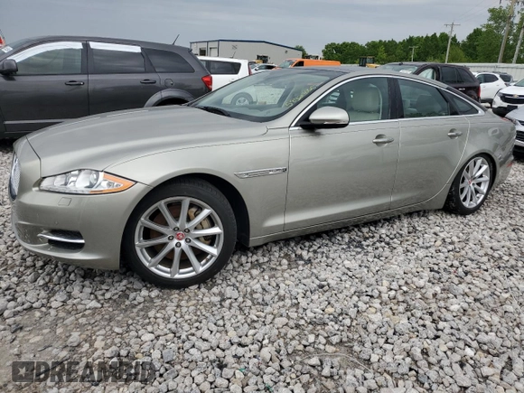 2014 Jaguar XJ z VIN SAJWJ1CD9E8V62338, wystawiony jako Copart lot #58924065 z przebiegiem 60 909 mil mil oraz Czysty tytuł • Clean title. Historia ofert i sprzedaży dostępna na DreamBid. Obrazek 1.