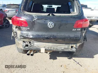2013 Volkswagen Tiguan S z VIN WVGAV3AXXDW594680, wystawiony jako IAAI lot #41652323 z przebiegiem 136 382 mil mil oraz . Historia ofert i sprzedaży dostępna na DreamBid. Obrazek 6.
