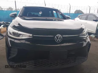 2021 Volkswagen ID.4 Pro S z VIN WVGTMPE26MP065481, wystawiony jako IAAI lot #41719800 z przebiegiem Nie podano mil oraz . Historia ofert i sprzedaży dostępna na DreamBid. Obrazek 13.