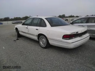 1996 Ford Crown Victoria LX with VIN 2FALP7466TX103371, listed as a Copart auction lot 70654804 with 160,147 mi miles and Non Repairable. Bid and sale history available at carsss.com. Image 2.