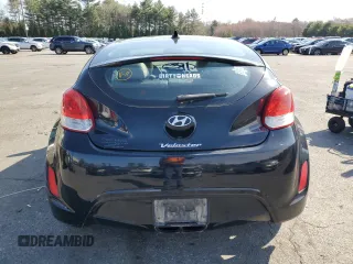 2013 Hyundai Veloster w/Black Int z VIN KMHTC6AD5DU173029, wystawiony jako Copart lot #52587455 z przebiegiem 161 716 mil mil oraz Czysty tytuł • Clean title. Historia ofert i sprzedaży dostępna na DreamBid. Obrazek 6.