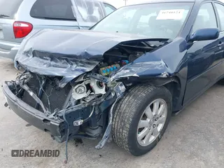 2004 Toyota Camry LE with VIN 4T1BF30K44U069441, listed as a IAAI auction lot 41740124 with 145,906 mi miles. Bid and sale history available at carsss.com. Image 6.