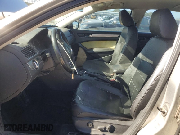 2014 Volkswagen Passat Wolfsburg Edition with VIN 1VWAS7A30EC074232, listed as a Copart auction lot 86975554 with 197,060 mi miles and Salvage title. Bid and sale history available at DreamBid. Image 7.