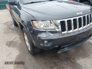 2013 Jeep Grand Cherokee Laredo with VIN 1C4RJFAG9DC506238, listed as a IAAI auction lot 41800981 with 172,676 mi miles. Bid and sale history available at carsss.com. Image 6.