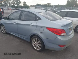 2013 Hyundai Accent GLS with VIN KMHCU4AE8DU583303, listed as a IAAI auction lot 42504235 with 113,992 mi miles and . Bid and sale history available at DreamBid. Image 3.