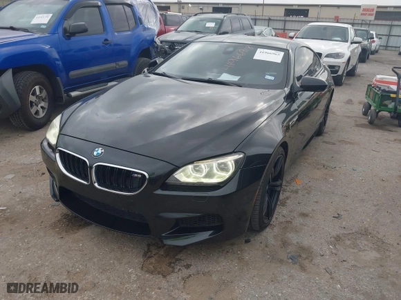 2013 BMW M6 with VIN WBSLX9C50DC968777, listed as a IAAI auction lot 41966918 with 113,458 mi miles. Bid and sale history available at carsss.com. Image 17.