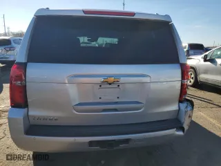 2020 Chevrolet Tahoe LT with VIN 1GNSKBKCXLR157872, listed as a Copart auction lot 79806594 with 129,729 mi miles and Salvage Title. Bid and sale history available at carsss.com. Image 6.