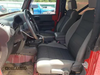 2007 Jeep Wrangler X with VIN 1J4FA24197L185416, listed as a Copart auction lot 59943735 with 147,984 mi miles and Salvage title. Bid and sale history available at DreamBid. Image 7.