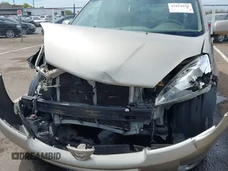 2005 Toyota Sienna XLE with VIN 5TDZA22C65S349045, listed as a IAAI auction lot 42014639 with 99,940 mi miles. Bid and sale history available at carsss.com. Image 6.