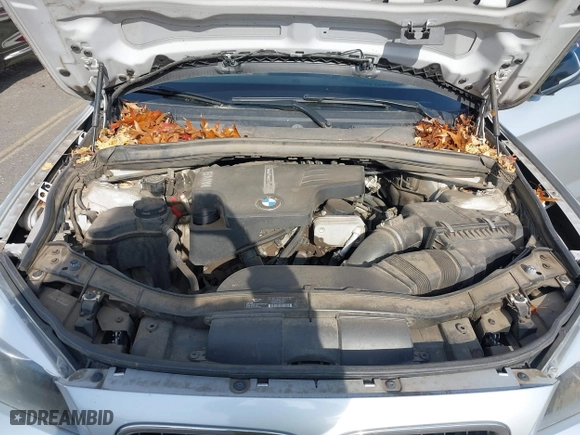 2014 BMW X1 sDrive28i with VIN WBAVM1C58EVW52847, listed as a IAAI auction lot 40779553 with 151,076 mi miles. Bid and sale history available at carsss.com. Image 10.