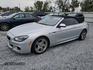 2014 BMW 6 Series 640i z VIN WBALW7C55EDX58960, wystawiony jako Copart lot #57889065 z przebiegiem 70 335 mil mil oraz Szkoda całkowita • Salvage title. Historia ofert i sprzedaży dostępna na DreamBid. Obrazek 1.