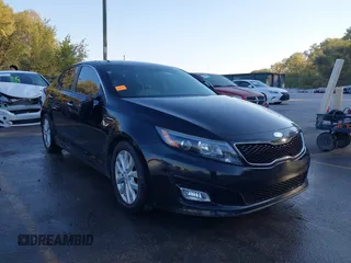 2014 Kia Optima LX z VIN 5XXGM4A74EG340750, wystawiony jako IAAI lot #40621278 z przebiegiem 104 192 mil mil oraz . Historia ofert i sprzedaży dostępna na DreamBid. Obrazek 1.