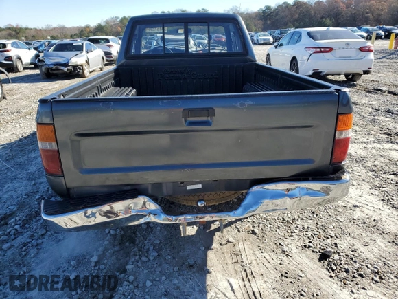 1993 Toyota Pickup DLX z VIN JT4RN93P7P5080335, wystawiony jako Copart lot #84757234 z przebiegiem 162 290 mil mil oraz Szkoda całkowita • Salvage title. Historia ofert i sprzedaży dostępna na DreamBid. Obrazek 6.