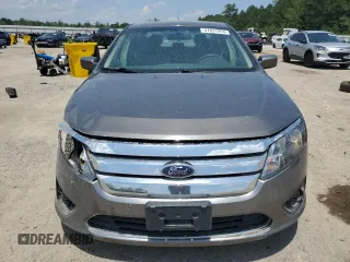 2012 Ford Fusion SE z VIN 3FAHP0HA0CR328833, wystawiony jako Copart lot #57631955 z przebiegiem 94 613 mil mil oraz Szkoda całkowita • Salvage title. Historia ofert i sprzedaży dostępna na DreamBid. Obrazek 5.
