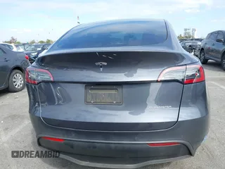 2021 Tesla Model Y Long Range with VIN 5YJYGDEE6MF209034, listed as a IAAI auction lot 41896238 with 53,401 mi miles. Bid and sale history available at carsss.com. Image 17.