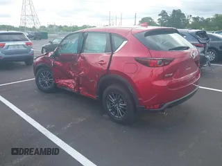 2019 Mazda CX-5 Sport with VIN JM3KFABM5K0627087, listed as a IAAI auction lot 42163866 with 38,050 mi miles and . Bid and sale history available at DreamBid. Image 3.