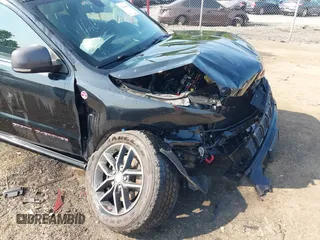 2018 Jeep Grand Cherokee Trailhawk with VIN 1C4RJFLG4JC241057, listed as a IAAI auction lot 42416590 with 81,822 mi miles and . Bid and sale history available at DreamBid. Image 17.