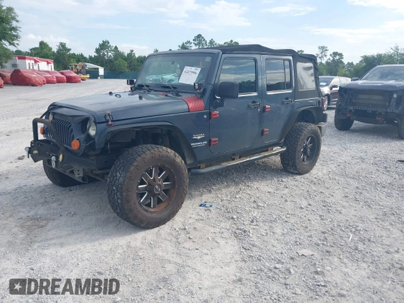 2007 Jeep Wrangler Unlimited Sahara with VIN 1J4GB59167L221686, listed as a IAAI auction lot 42473996 with 151,065 mi miles and . Bid and sale history available at DreamBid. Image 2.